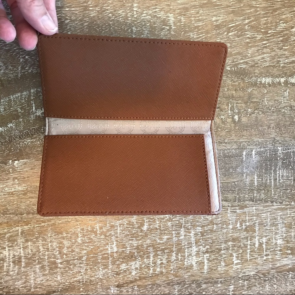 Michael Kors checkbook wallet, like new. $15